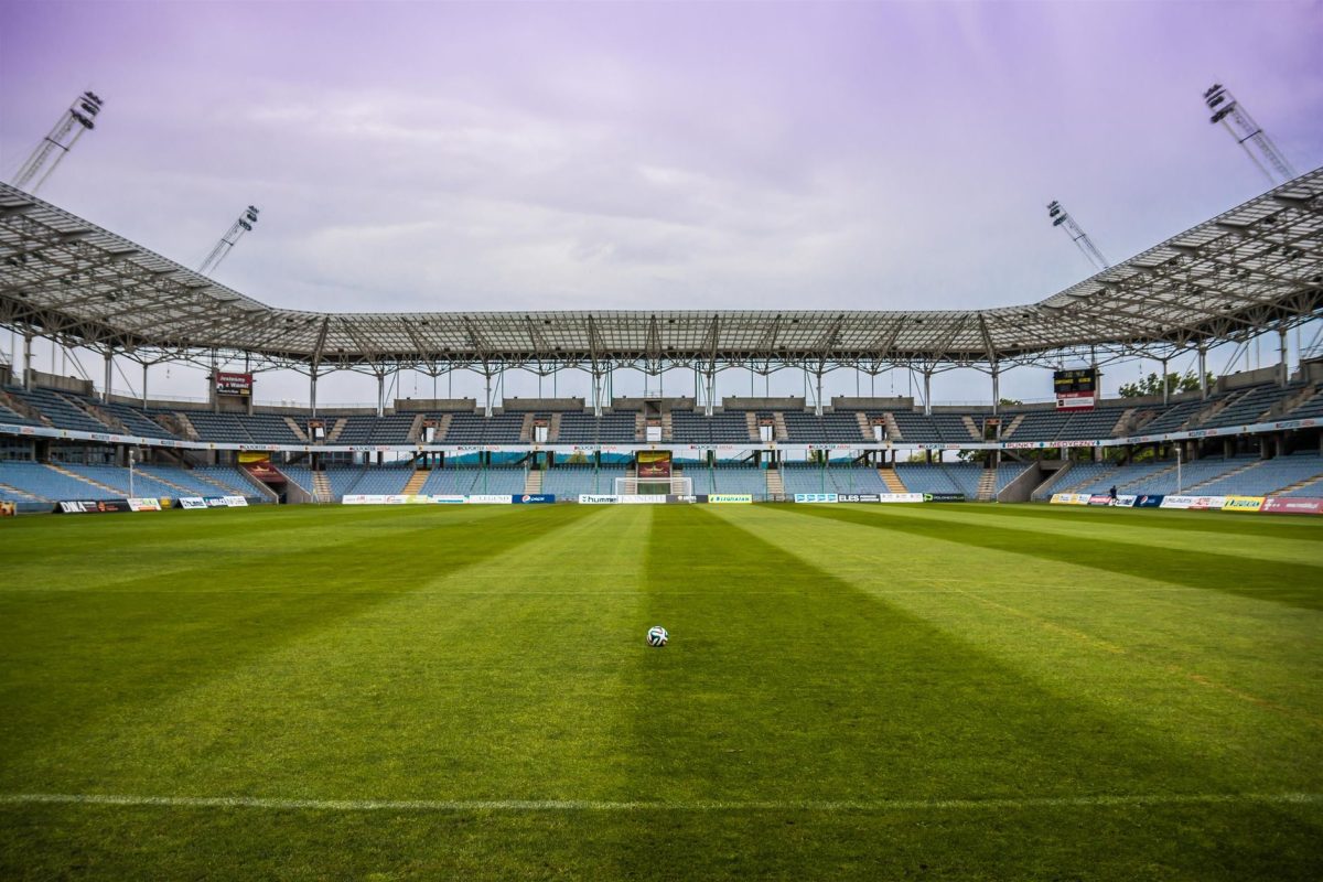 empty football stadium soccer ball grass close up football pitch aerial empty